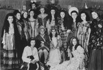 Group portrait of Jewish youth dressed in Purim costume at the Ulm displaced persons camp.