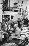 Passengers crowd the deck of the MS St. Louis.

Among those pictured are Georg Lenneberg, Fritz Hilb, Ruth and Ilse Karliner.