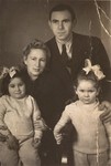 Henia Wisgardisky with her parents and cousin, Bluma Berk, in the Zeilsheim displaced persons camp.