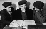 Students study Talmud at a Yeshiva in the Zeilsheim displaced persons camp.
