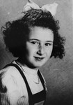 Portrait of Marion Kaufmann, age nine, taken at the home of her rescuers shortly before her reunification with her mother.