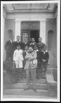 Rabbi Riccardo Pacifici  poses with students at the Rabbinical College in Rhodes in front of the main entrance.