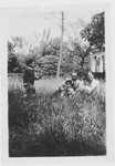 The Tagliacozzo family relaxes in a garden.

Seated are Giovanni Dell'Ariccia and Adele Tagliacozzo Dell'Ariccia and their sons David and Leilo.