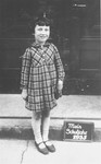 Nettie Stub poses next to a chalkboard on the first day of school.