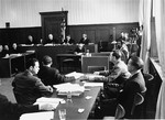 Members of the prosecution team (foreground) during a session of the Milch Trial.