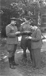 Solly Perel (right) converses with two Soviet officers during his service as a translator for the Red Army.