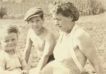 Janek Kon Konorski (center), a Jewish boy in hiding, enjoys a summer holiday with his rescuer, Maria Szelagowska Teski (right) and her daughter, Joanna.