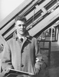 A crew member of the President Warfield (later the Exodus 1947) poses on the deck of the ship before its departure for Europe.