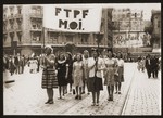 A group of Jewish women, members of the emigre section of F.T.P.F.( Franc Tireurs et Partisans Francais), a communist dominated resistance organization, during liberation celebrations.