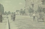 Jews walk down the main street of the Lodz ghetto.