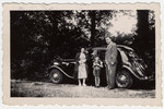 Steven Simon in middle with his parents, Irma Rachel Simon and Arthur Simon, next to their family car on vacation in 1939 prior to WW II.