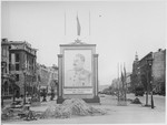A portrait of Stalin stands in a street in Berlin after the fall of the city.