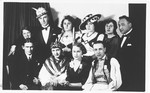 Group portrait of young Jewish men and women dressed in costumes in Osijek, Croatia.