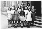 Ida Szajnfeld poses with other schoolmates in a Catholic school after the war.