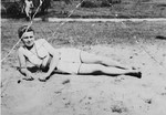Rachel Kolin relaxes on a beach in Olkusz.

The donor, Hela, had this photo with her in the Markstadt labor camp and gave it to her future husband, Szulim, before the two became separated.