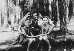 A group of children pose together in a forest near Olkusz.