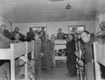 Survivors in a barracks in the Ampfing concentration camp several days after liberation.