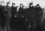 A group of prisoners pose in the Beaune-la-Rolande transit camp.