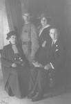Studio portrait of a Jewish family in Sarajevo.

Pictured are Michael, Leon and Erdonja Kabilio with their mother.