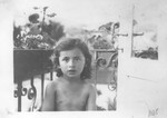 Portrait of a young Jewish girl, Lida Kleinman, sitting on the balcony of her home in Lacko, Poland.