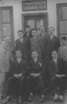 A group of Jews and non-Jews pose outside a club in Vlasenica, Bosnia.