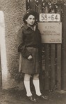 Renia Kochman stands outside entrance to the Warburg children's home in Blankenese.