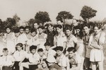 Group portrait of members of the soccer team in the Neu Freimann displaced persons camp.