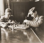 Two youths play a game of chess at the Baruch Auerbach Jewish orphanage in Berlin.