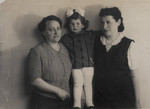Portrait of two women and a young child in the Tarnow ghetto.