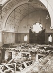Prayerbooks lie scattered on the floor of the choir loft in the Zerrennerstrasse synagogue, destroyed on Kristallnacht.