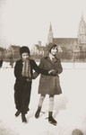 Inge Marx ice skates with her friend, Hannah Lichtenauer.