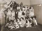 Children in Inge Marx's dance class pose in their costumes.