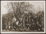 Group portrait of Jewish youth and staff from the OSE children's homes at Collognes and Le Tremplin.