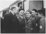Lazare Gurvic greets members of the Buchenwald children's transport upon their arrival in the Les Andelys train station.