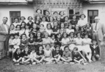 Group portrait of teachers and students of the Hebrew language school in Sanisesti, Romania.