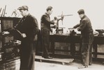 Jewish refugees at work in a metalshop in the Pingliang Road Home in Shanghai.