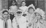 Jewish refugee children in the Chabannes children's home pose dressed in Purim costumes.