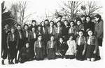 Group portrait of members of the Nitzanim Zionist youth group all in uniform, at the Selvino children's home.