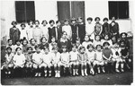 Girls in a school in Oradea, Romania.

Magda Grunfeld is pictured in the front row, center.