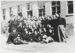 Group portrait of a Jewish police force in the Bergen-Belsen displaced persons camp.