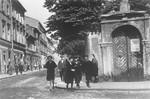A group of Jewish children cross a street in Kazimierz, the Jewish quarter of Krakow.
