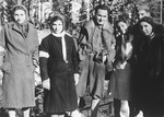 Local Jewish women wearing armbands pose with Jewish conscripts in the Hungarian Labor Service near the Hungarian-Jewish Labor Camp where Company 108/57 was housed.