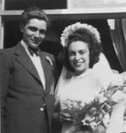 Portrait of a Jewish bride and groom at their wedding in the Westerbork transit camp.