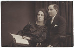 Studio portrait of a Romanian-Jewish couple.

Pictured are Ephraim and Dolly Neuman.