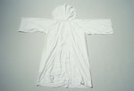 White clerical robe [kittel] that belonged to Rabbi Simon Hevesi.