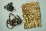 A set of Jewish ritual phylacteries (tefillin) and a gold velour tefillin bag originally owned by Rabbi Ferenc Hevesi.