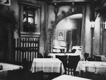 Interior view of the dining room of a kosher boarding house in Budapest.