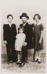 Studio portrait of a Jewish family in Brussels, Belgium.