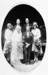Group portrait of members of the wedding party at the marriage of Paul and Berthe Hendrix.