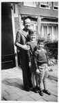 A Dutch Jewish father poses with his two sons outside their home in Amsterdam.